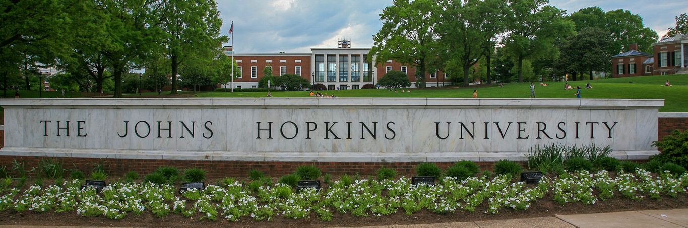 The sign of Johns Hopkins University in spring