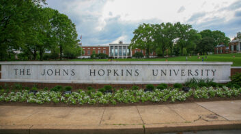 The sign of Johns Hopkins University in spring