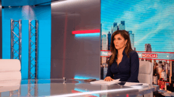 Rachel Campos-Duffy sitting at the Fox Noticias desk
