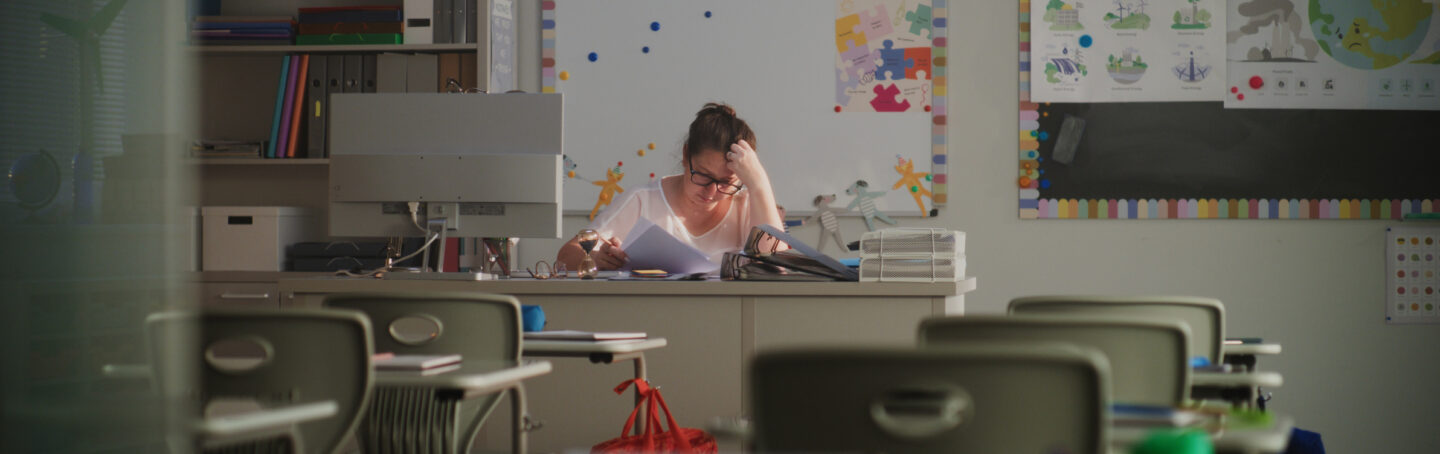 Female Teacher Checking Homework of Students, Grading School Tests After Class
