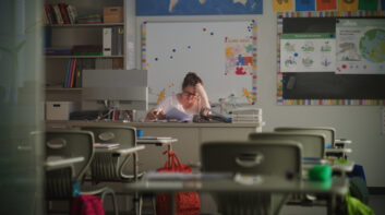 Female Teacher Checking Homework of Students, Grading School Tests After Class