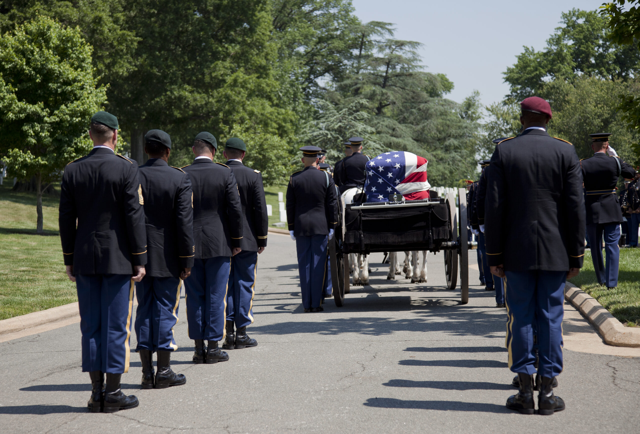 Various photos from the burial services of U.S. Army Staff Sgt. Michael Harrison Simpson