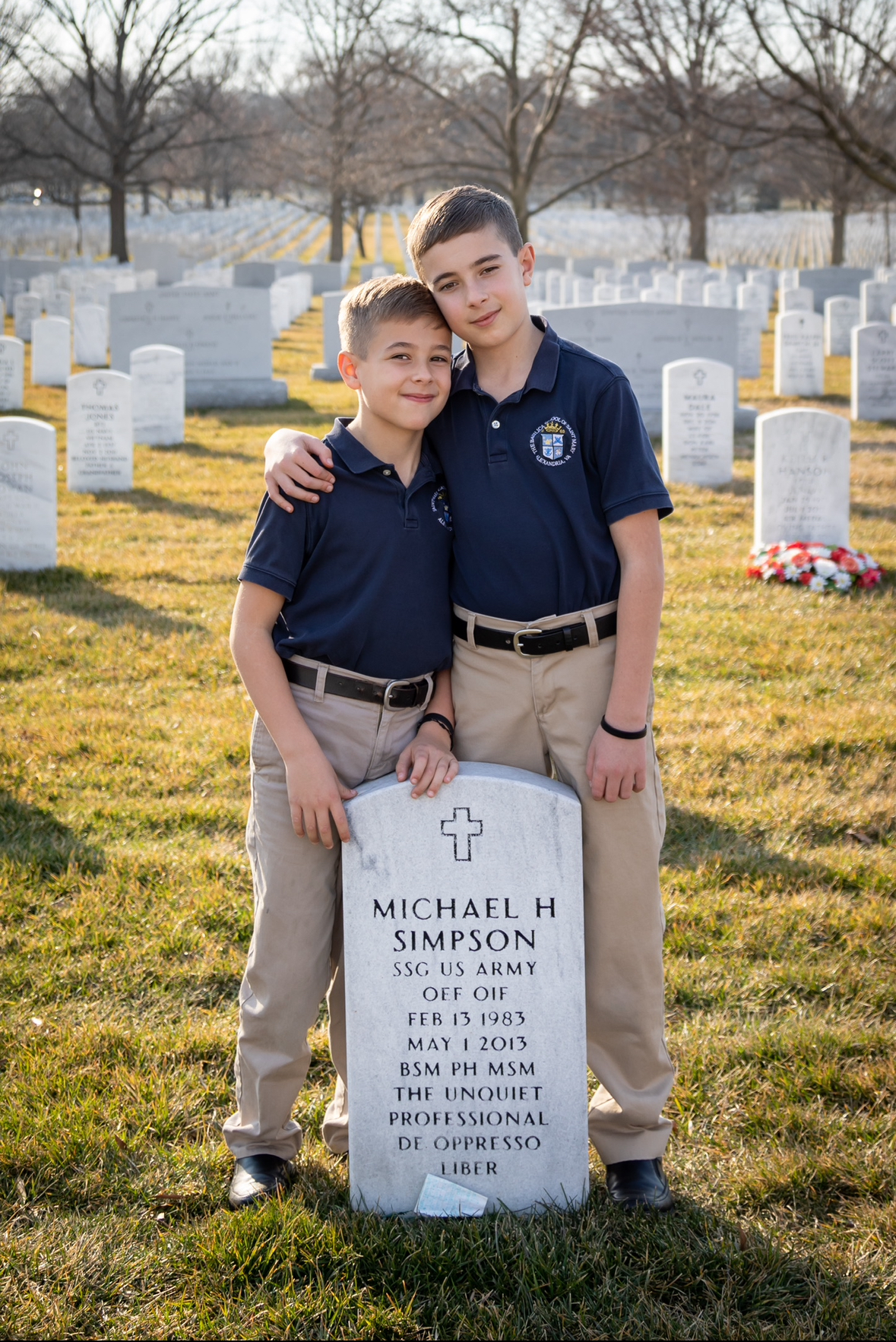 Anderson's sons stand by her their father's grave stone