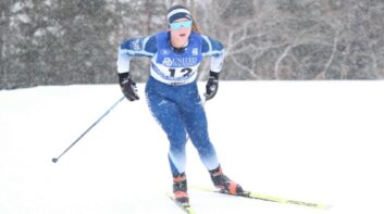 Cassidy Carlisle cross country skiing in a snow storm