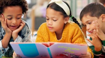 Children reading together in a library