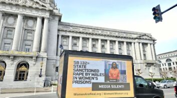 California women's prisons truck ad in front of state capitol building
