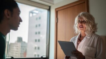 Doctor speaking to young patient