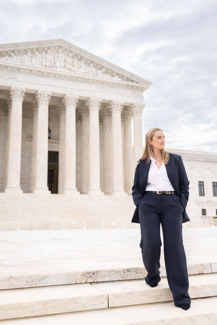 Emily Jashinsky on the steps of the Supreme Court 