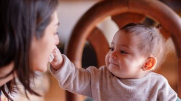 Mother and her baby eating together