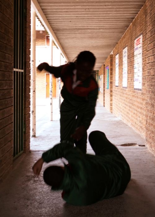 Teenager beating up another student