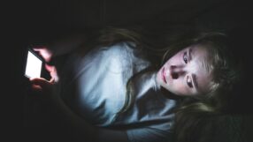 Young girl scrolling online