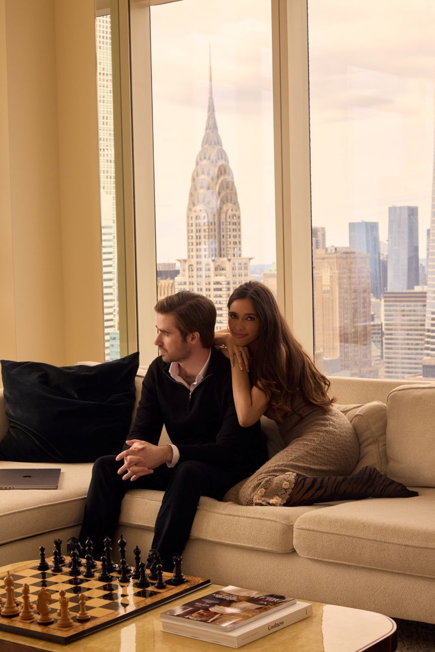Brittany Hugoboom with her husband in their NYC apartment