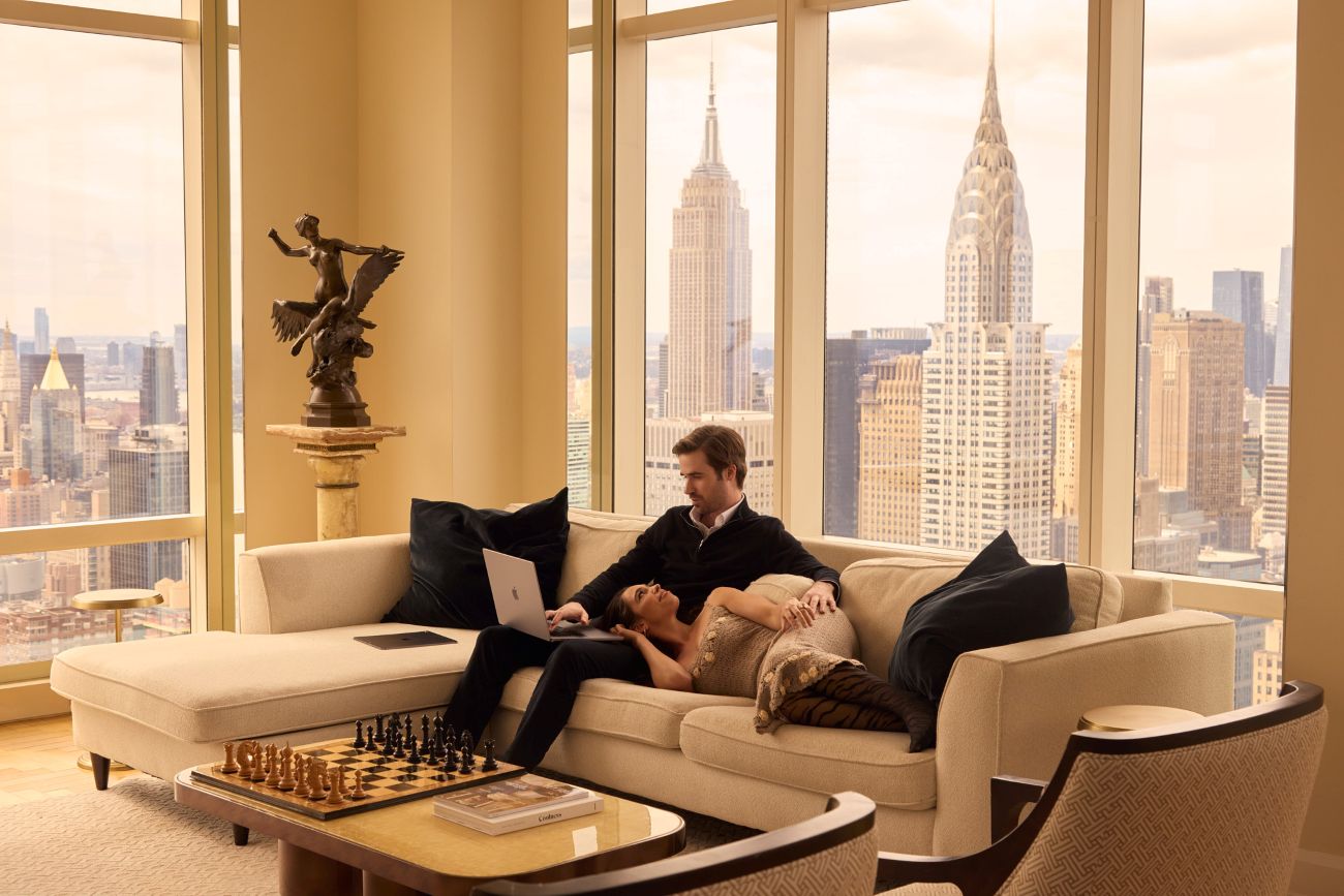 Brittany Hugoboom with her husband in their NYC apartment