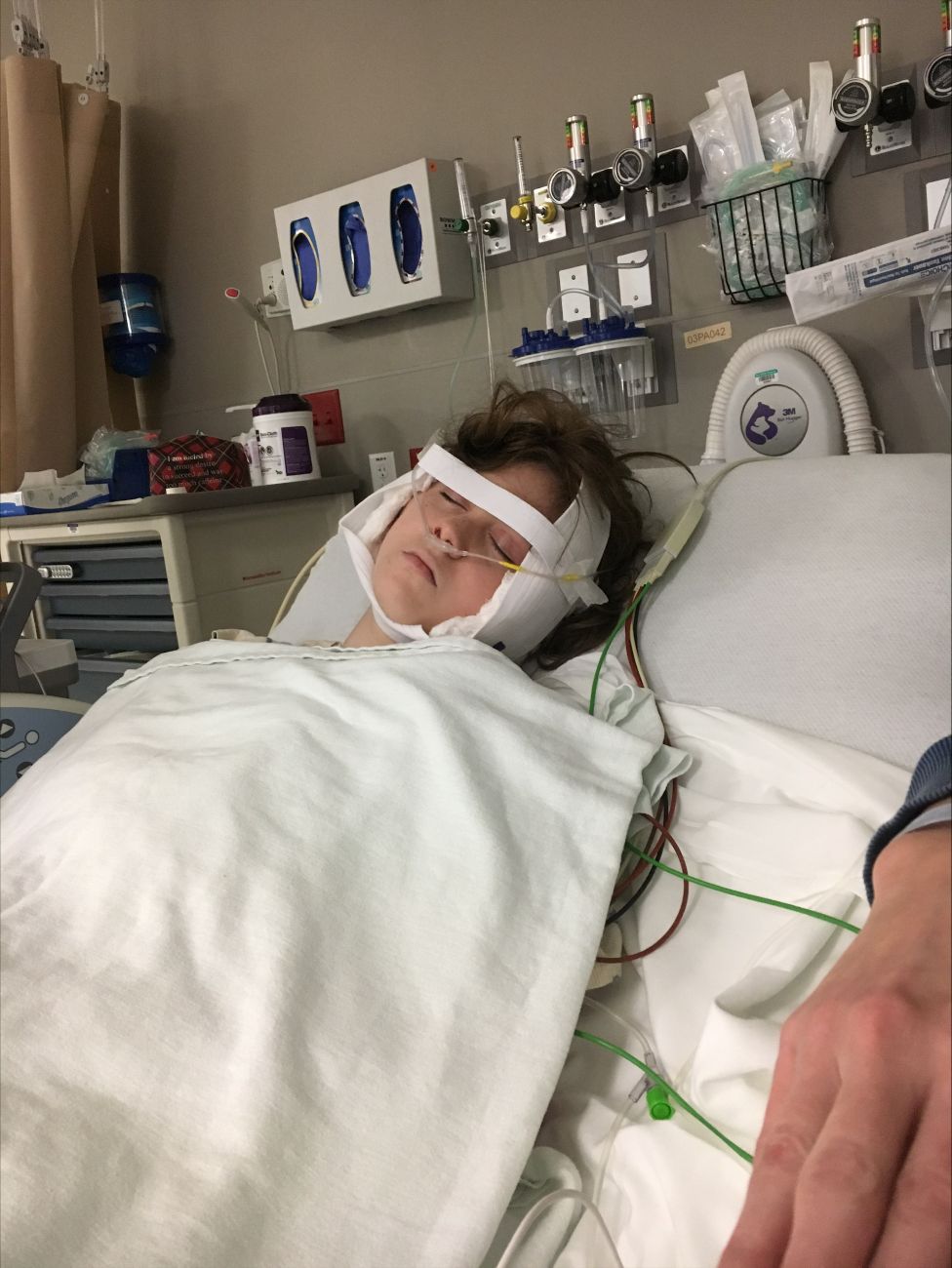 Brooke Garner in the hospital after thyroid cancer surgery