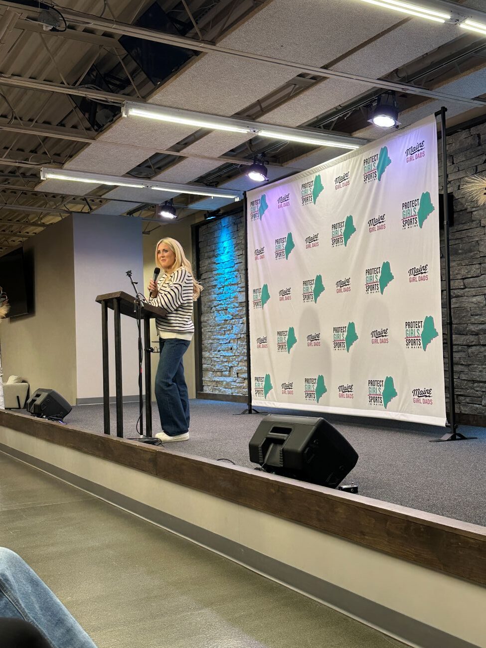Riley Gaines speaking at a Maine Girl Dads event