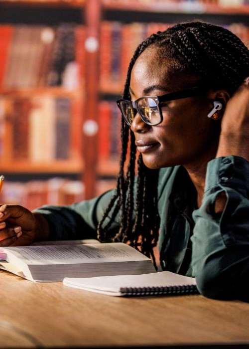 Student reading a textbook