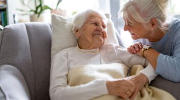 Woman caring for her elderly mother