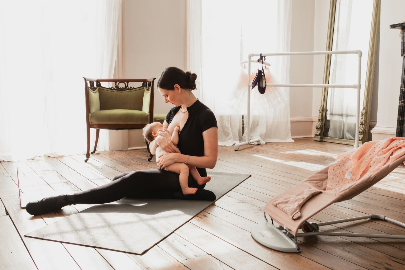 Bowers nursing her baby daughter