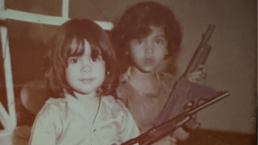 Judy Pino as a child with a rifle featured image