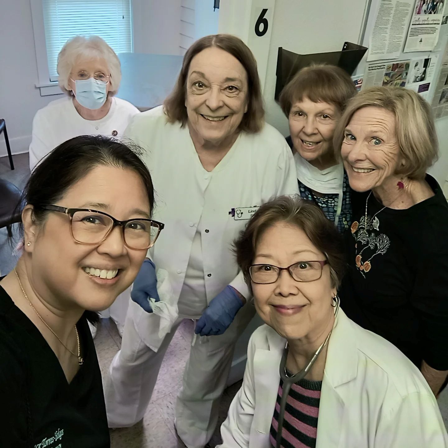 Dr. Torres Hodges volunteering podiatric care at St. Joseph's Medical Clinic