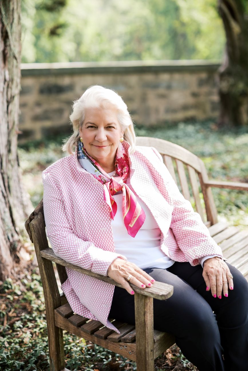 Mary Pope Hutson sitting on a bench