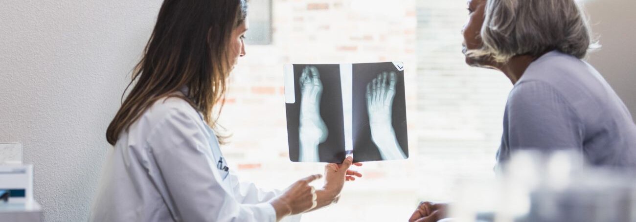 Podiatrist and patient